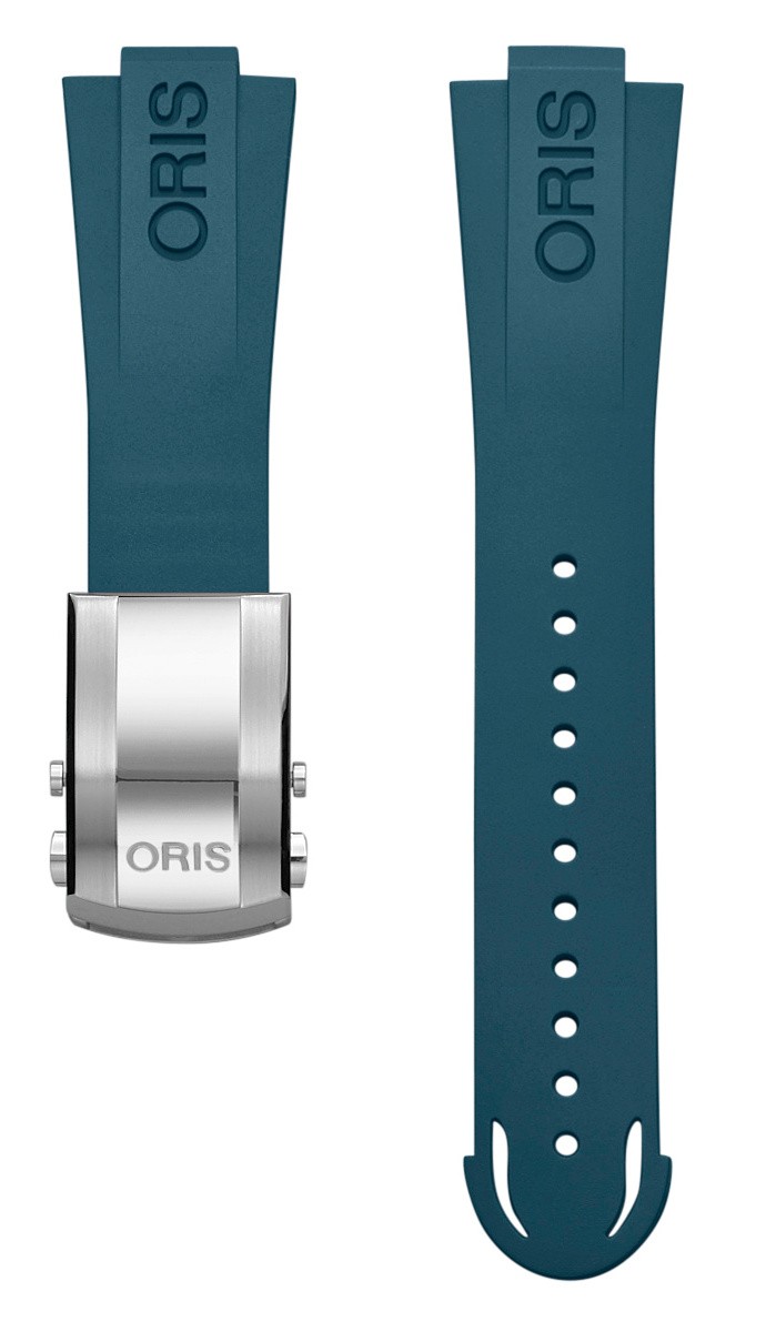Ремешок для часов Oris из каучука, синий, со стальной клипсой Каучуковые ремешки идеально подходят для активного образа жизни. Они легче и теплее металлических браслетов, а ощущаются на руке как вторая кожа. Большое преимущество каучука в том, что он не боится воды. У нас присутствуют только высококачественные материалы и оригинальный товар от производителя.